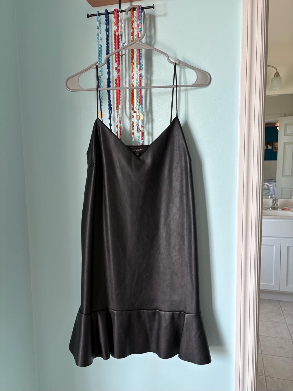 Olivaceous Black Vegan Leather Mini Slip Dress with Ruffle Hem